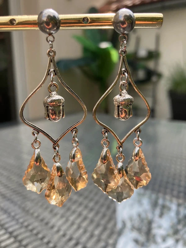 Boucles d’oreilles lustre bouddha acier inoxydable et pierre de Verre. Excellent état