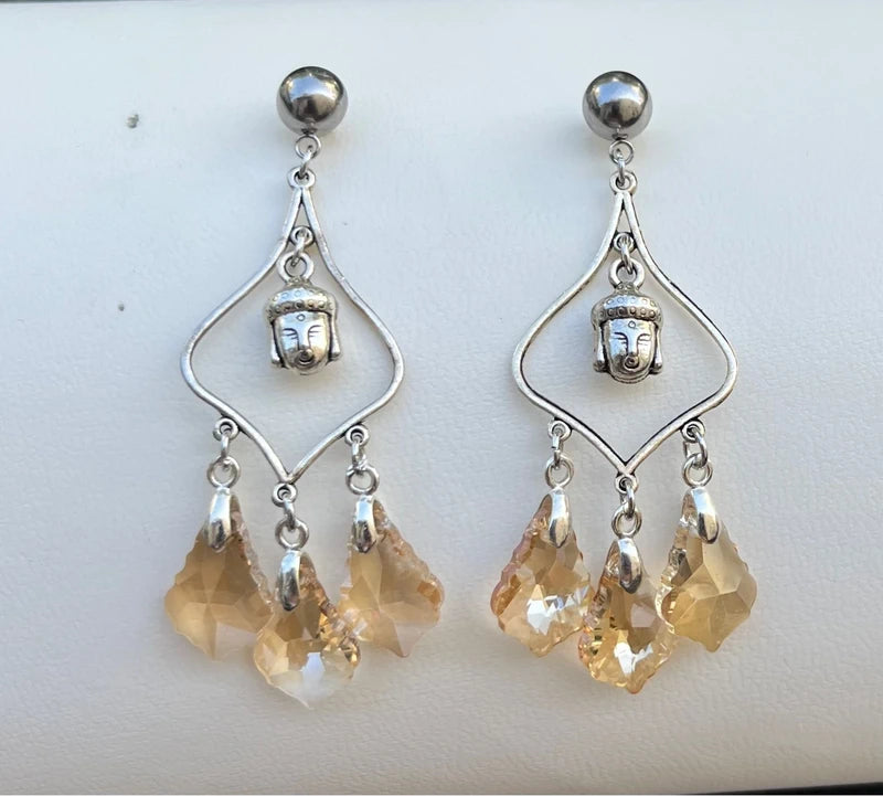 Boucles d’oreilles lustre bouddha acier inoxydable et pierre de Verre. Excellent état