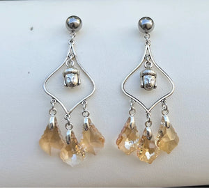 Boucles d’oreilles lustre bouddha acier inoxydable et pierre de Verre. Excellent état