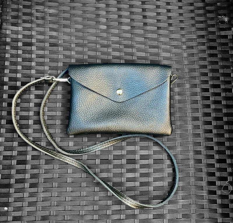 Pochette sac en bandoulière petit format en cuir graine excellent état